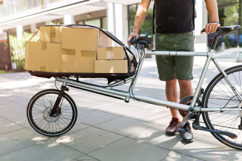 Onflight bike courier making a delivery